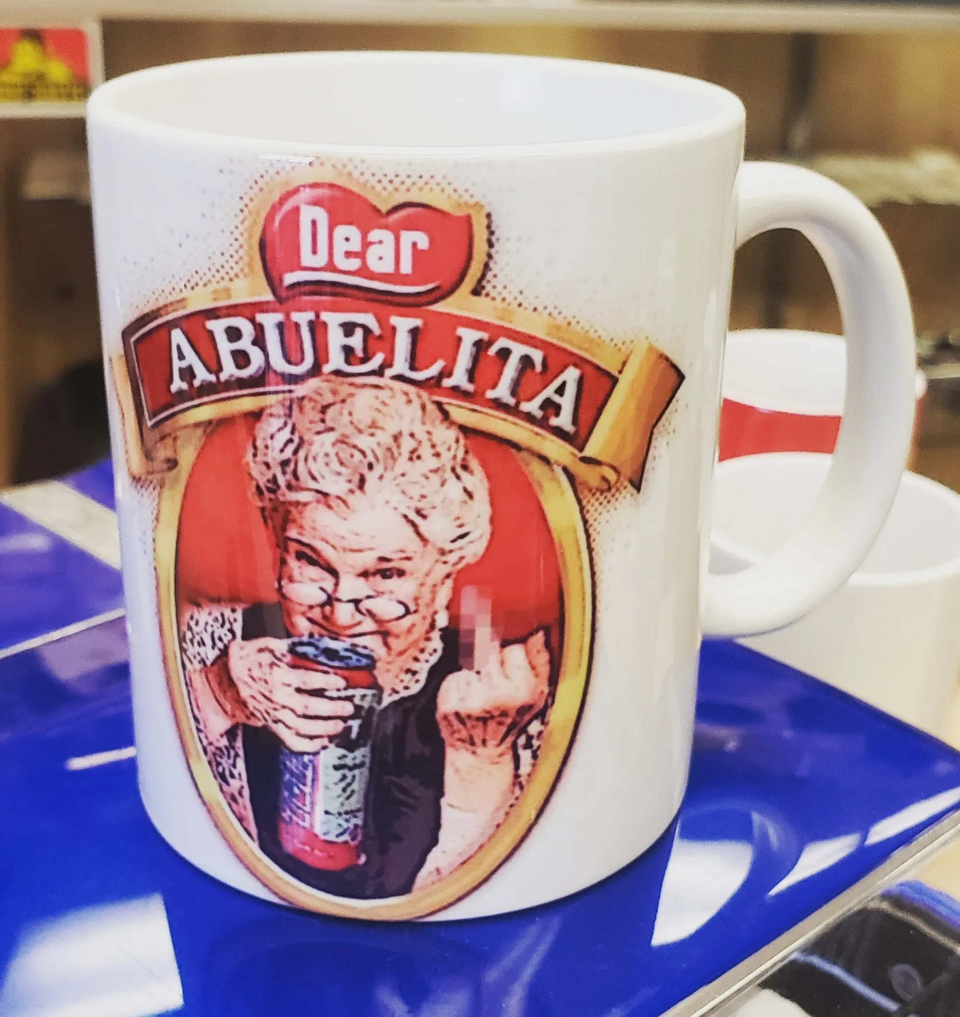 Abuelita Tecate Coffee Mug 11oz. on white mug